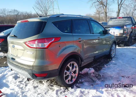2013 Ford Escape Titanium z USA, uszkodzony, nr VIN 1FMCU0J96DUD41797